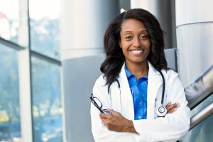 Female doctor smiling in hospital setting