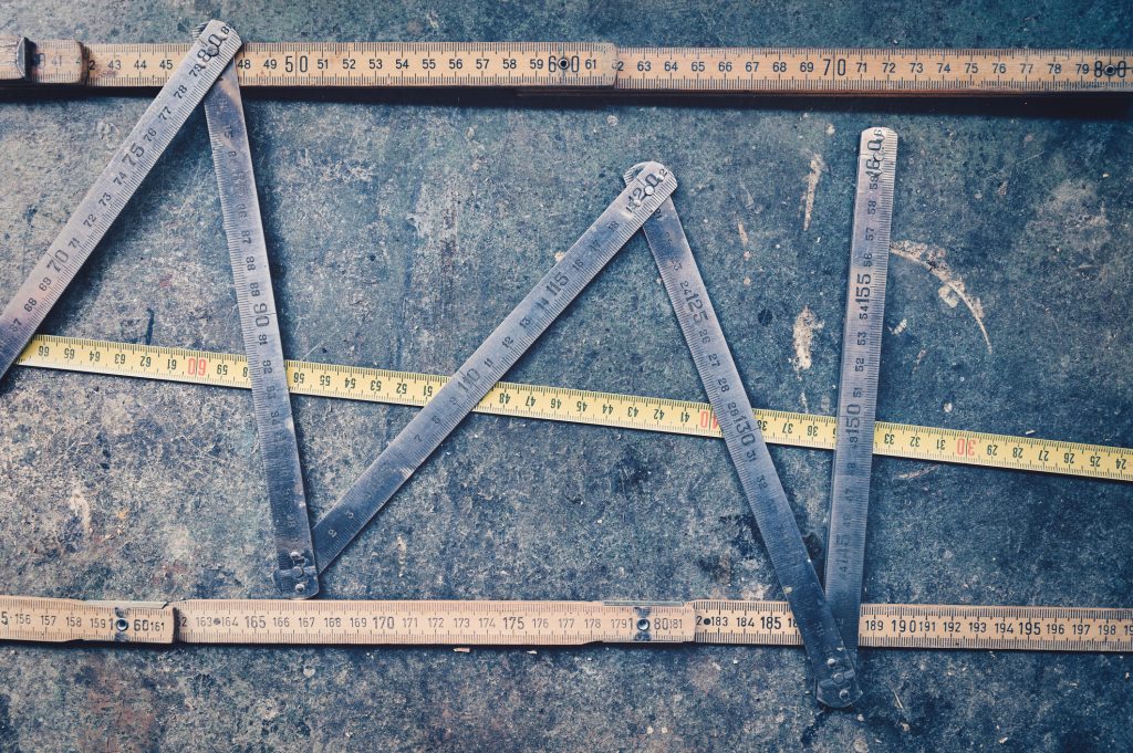 Several measuring rulers