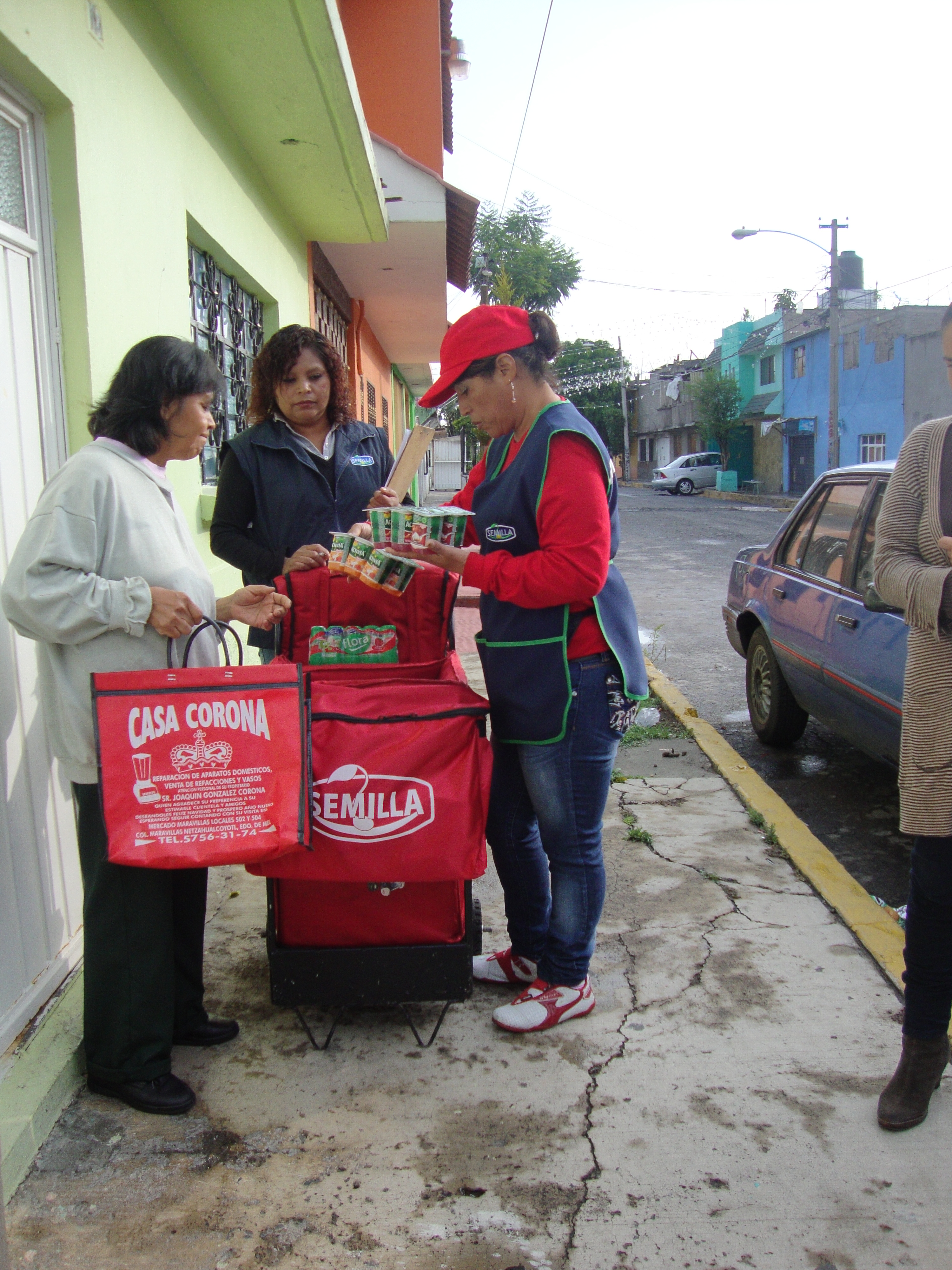 Woman selling Danone products door to door