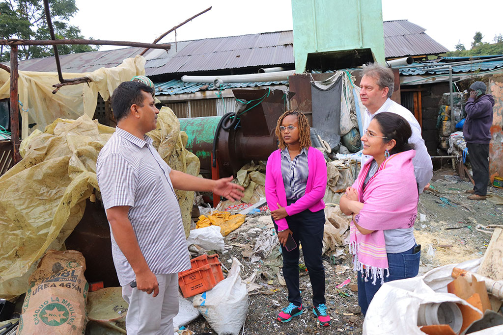 IKEA Foundation, KCIC, and WDI staffers meet waste management entrepreneur Muhammad Iqbal at his company, Green Shizuka, in Limuru, Kenya. Image courtesy of KCIC.